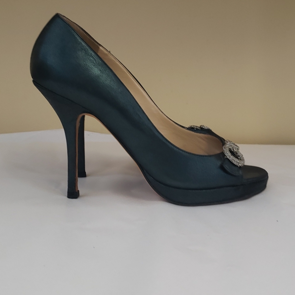 Jimmy Choo peacock blue open toed heels.